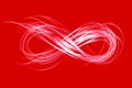 Infinity sign created by neon light on a red background