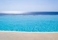 Infinity swimming pool with view on Aegean Sea Royalty Free Stock Photo