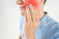 Inflammation of the dental nerve, man with tooth ache, periodontal disease, wisdom teeth pain Royalty Free Stock Photo