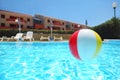 An inflatable ball lies in pool