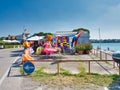 Inflatable beach tent on the shores of Lake Garda in Italy Royalty Free Stock Photo