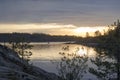 Inflatable boat with a motor on a lake at sunrise Royalty Free Stock Photo