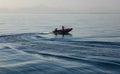 inflatable boat with sailors to provide divers near a coral reef in the Red Sea, Egypt Royalty Free Stock Photo