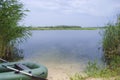 Inflatable boat at the shore of the lake