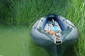 Inflatable Boyard is approached by banks on the river Royalty Free Stock Photo