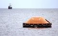 Inflatable lifeboat at sea Royalty Free Stock Photo