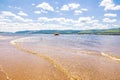 Inflatable liferaft on the Volga River against the backdrop of the Zhiguli Mountains on a summer sunny day