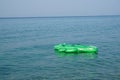 Inflatable mattress crocodile on water surface Royalty Free Stock Photo