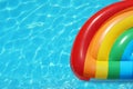 Inflatable mattress floating in swimming pool on sunny day, top view Royalty Free Stock Photo