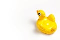 Inflatable mini yellow chicken or duckling on white background, pool float party. Flat lay copy space. Trend Inflatable Children