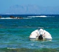 Inflatable motor boat on sea. Royalty Free Stock Photo