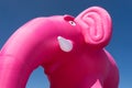 Inflatable pink elephant on a background of blue sky Royalty Free Stock Photo