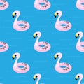 Inflatable Pink Flamingo Toy Seamless Pattern on Blue. Swimming Pool Ring for Kids. Rubber Tropical Bird Shape Royalty Free Stock Photo