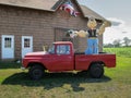 Inflatable Popeye in the back of red truck