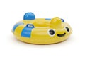 Inflatable ring float with a cheerful yellow and blue fish design Royalty Free Stock Photo