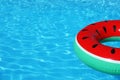 Inflatable ring floating in swimming pool on sunny day Royalty Free Stock Photo