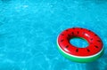 Inflatable ring floating in swimming pool on sunny day. Royalty Free Stock Photo