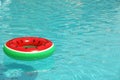 Inflatable ring in pool on sunny day Royalty Free Stock Photo