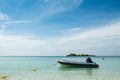 Inflatable rubber motor boat floating on blue sea with blue sky background, Samae San island, Sattahip, Chon Buri, Thailand Royalty Free Stock Photo