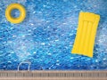 Inflatable toys floating on pool top view Royalty Free Stock Photo