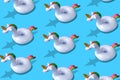 Inflatable unicorn pool toy pattern onl blue background. Royalty Free Stock Photo