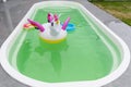 Inflatable unicorn on the surface of the pool Royalty Free Stock Photo