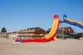 Inflatable water slide on the beach