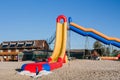 Inflatable water slide on the beach