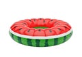 Inflatable watermelon pool float with red inner circle and green outer rim Royalty Free Stock Photo