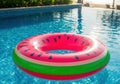 Inflatable watermelon ring float on a swimming pool Royalty Free Stock Photo