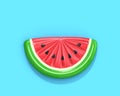 Inflatable watermelon slice on blue background with clipping pat