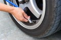 Inflate tires and check Pressure of tires Royalty Free Stock Photo