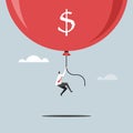 A businessman flying high with a inflated balloon Royalty Free Stock Photo