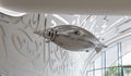 An inflated balloon with propellers in the form of a dolphin flies inside the Museum of The Future in Dubai city, United Arab