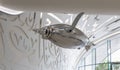 An inflated balloon with propellers in the form of a dolphin flies inside the Museum of The Future in Dubai city, United Arab