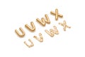 Inflated, deflated gold U V W X letters, balloon font