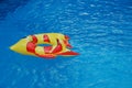 Inflated Toys In A Swimming Pool Royalty Free Stock Photo