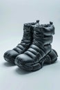 Inflated Winter High Boots on Solid Background. Generative AI