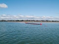 Inflatible oil boom towards Tauranga beach.