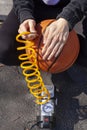 Inflating a ball with air compressor