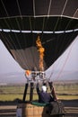 Inflating a hot-air balloon during a festival event