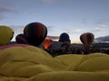 View of stages of inflation at the Albuquerque International Balloon Fiesta with a beautiful Sunrise. Royalty Free Stock Photo