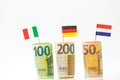 Inflation and economic recession in Europe. Flags of Germany, France and Italy euro bills on a white background.euro Royalty Free Stock Photo