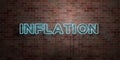 INFLATION - fluorescent Neon tube Sign on brickwork - Front view - 3D rendered royalty free stock picture