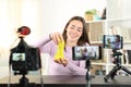 Influencer recording video with multiple devices.jpg Royalty Free Stock Photo