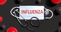 Influenza theme with mask and stethoscope Royalty Free Stock Photo