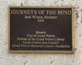 Info plaque for \'Journeys of the Mind\' by Jack Wilson outside the Main Library of Grand Prairie, Texas.