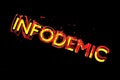 Infodemia lettering concept about pandemia and false information with coronavirus covid-19. 3d illustration isolated on Royalty Free Stock Photo