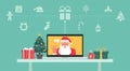 Santa Claus hand greeting via video calling on the laptop with Christmas icon and decoration