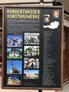 The information billboard shows photos and location of variety architecture projects of the artist Friedensreich Hundertwasser.